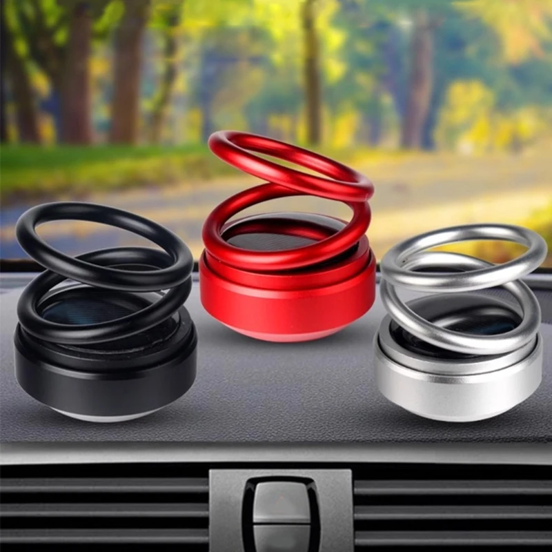 Autó belső légfrissítők Napelemes kettős gyűrűk Forgó felfüggesztésű parfümök Illatanyagok Diffúzor műszerfal dekoráció Dekoráció Dísz