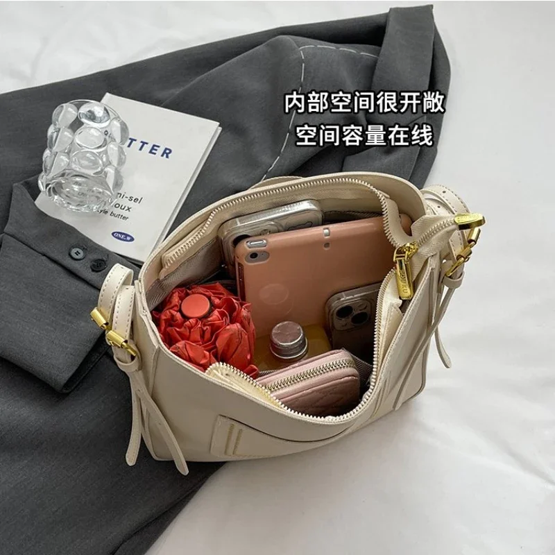 Ingyenes szállítás alkalmi női táska, divatos és fiatalos sokoldalú válltáska, kiváló minőségű és nagy kapacitású crossbody táska