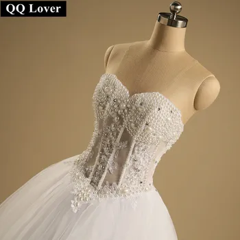 Esküvői ruha 2023 Szexi egyedi készítésű Seethrough Back gyöngyök esküvői ruhák valódi képekkel